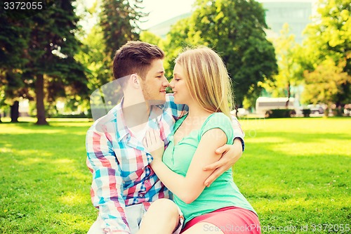 Image of smiling couple in park