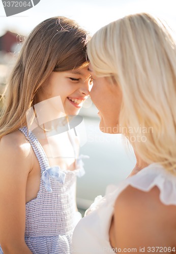 Image of happy mother and child girl
