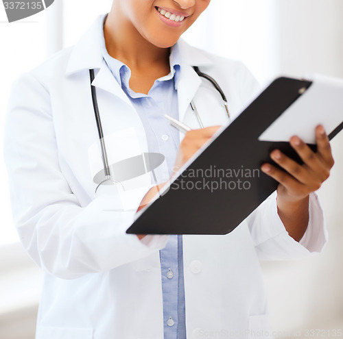 Image of african female doctor in hospital