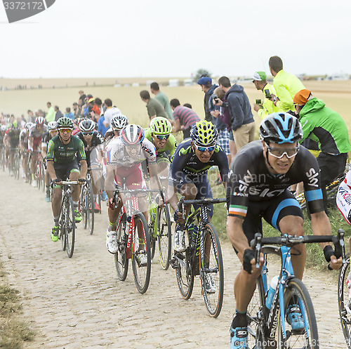 Image of Nairo Quintana Riding on a Cobblestone Road - Tour de France 201