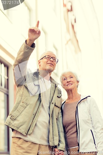 Image of senior couple on city street