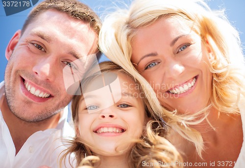 Image of happy family with blue sky