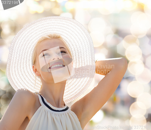 Image of beautiful woman enjoying summer outdoors