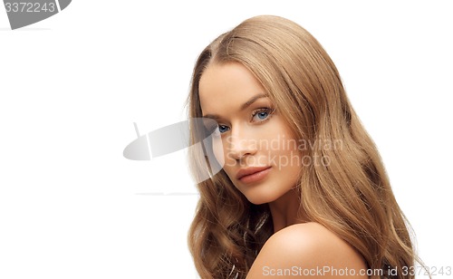 Image of beautiful woman face with long blond hair