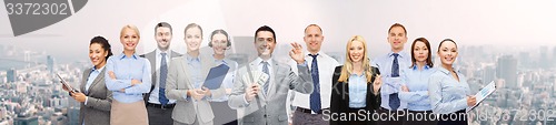 Image of group of happy businesspeople with dollar money