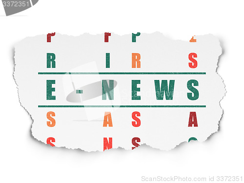 Image of News concept: word E-news in solving Crossword Puzzle