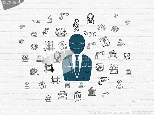 Image of Law concept: Business Man on wall background