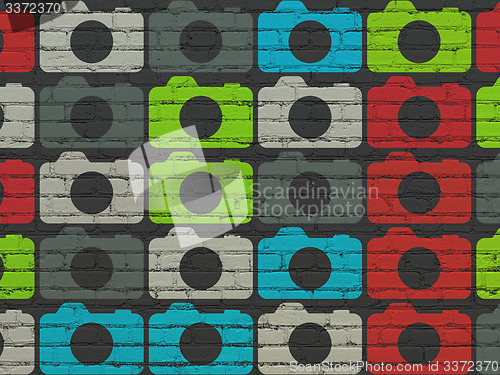 Image of Tourism concept: Photo Camera icons on wall background