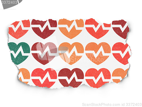 Image of Health concept: Heart icons on Torn Paper background