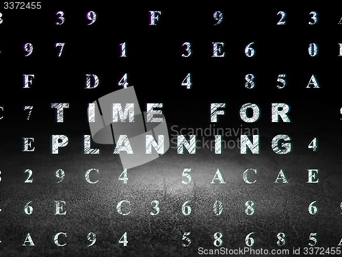 Image of Time concept: Time for Planning in grunge dark room