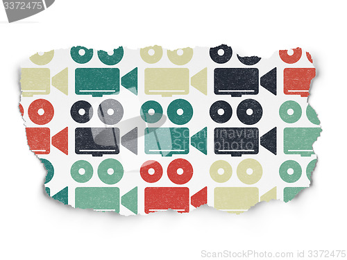 Image of Vacation concept: Camera icons on Torn Paper background