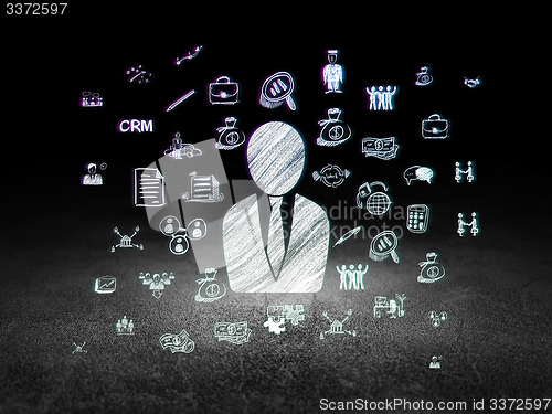 Image of Business concept: Business Man in grunge dark room