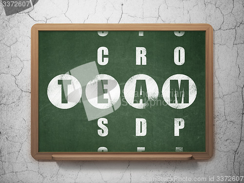 Image of Business concept: word Team in solving Crossword Puzzle