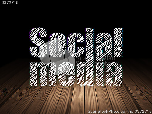 Image of Social network concept: Social Media in grunge dark room