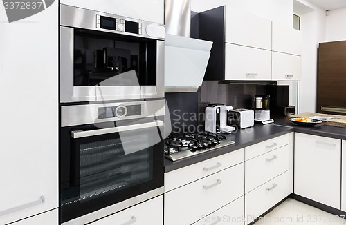 Image of Modern hi-tek kitchen, clean interior design