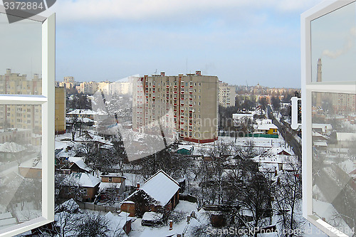 Image of open window to the winter city