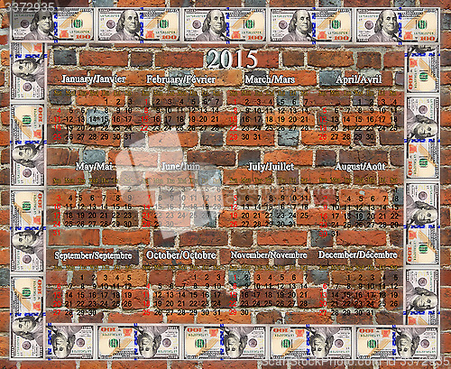 Image of calendar for 2015 year with frame from the dollars
