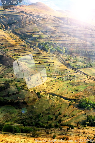 Image of sun beautiful light over the hills