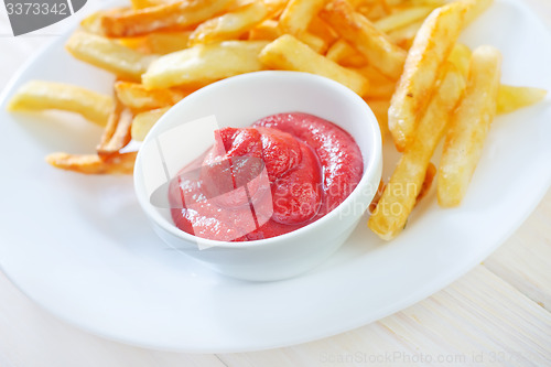 Image of potato fries with sauce