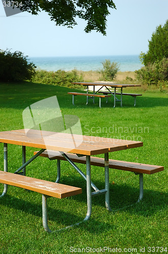 Image of Picnic Tables on the Shore