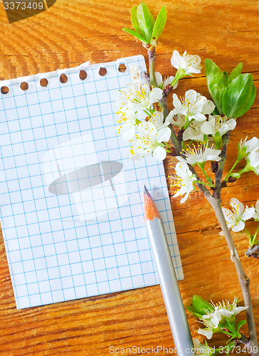 Image of flowers on wooden background