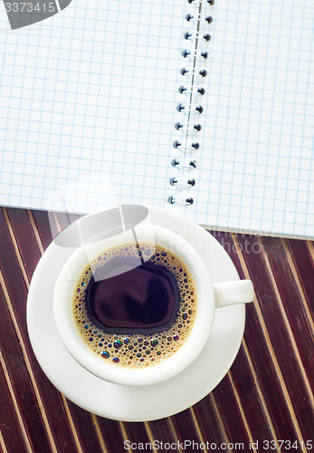 Image of coffee and note