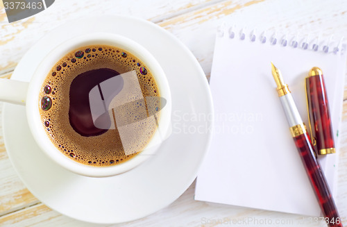 Image of coffee and note