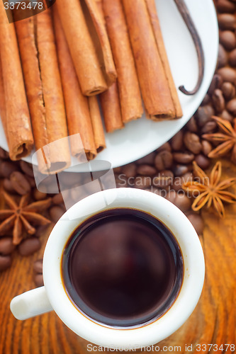 Image of Fresh aroma coffee in the white cup, coffee and cinnamon