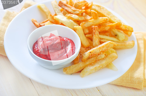 Image of potato fries with sauce