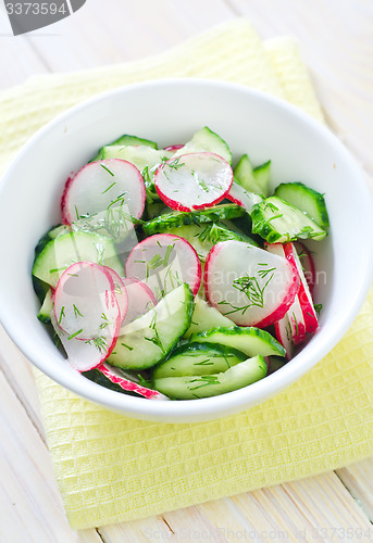 Image of fresh salad with cucumber and radish