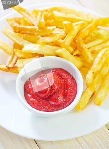 Image of potato fries with sauce