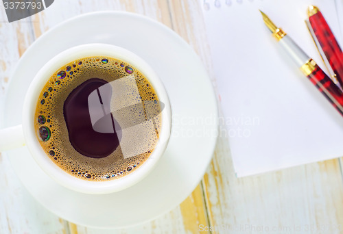 Image of coffee and note