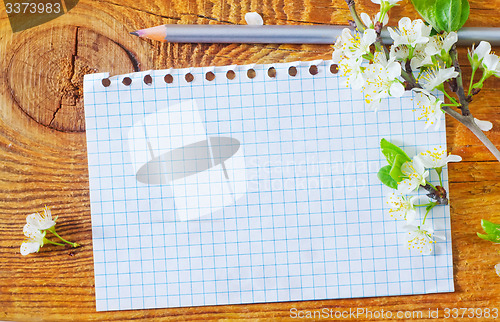 Image of flowers on wooden background