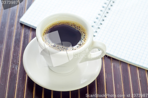 Image of coffee and note