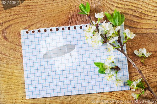 Image of flowers on wooden background