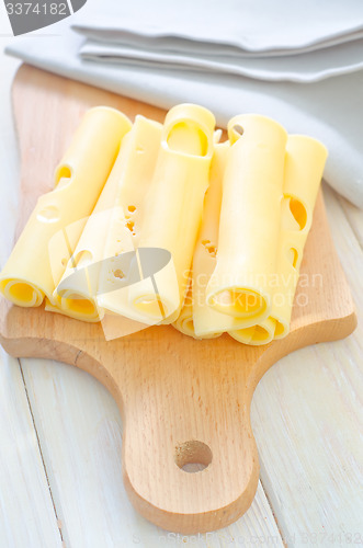 Image of cheese on wooden board