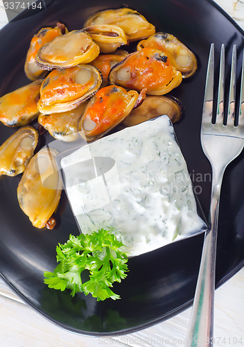 Image of mussels with sauce