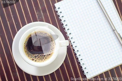 Image of coffee and note