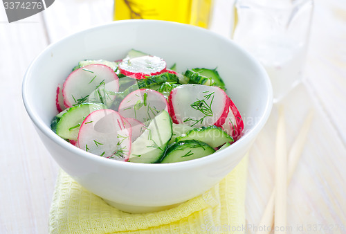 Image of fresh salad with cucumber and radish