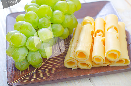 Image of cheese  and grape