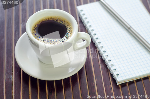 Image of coffee and note