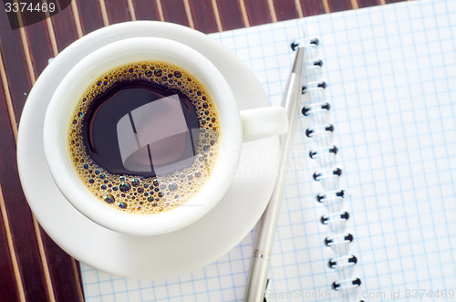 Image of coffee and note