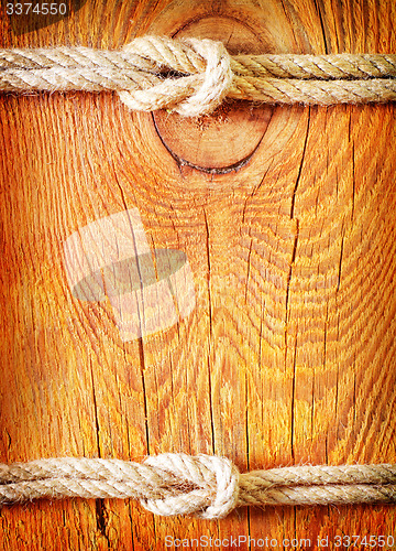 Image of rope on wooden background