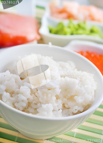 Image of ingredients for sushi, sakmon and cucumber