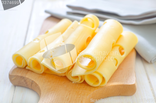 Image of cheese on wooden board