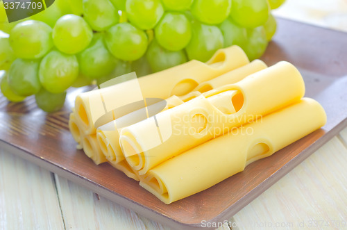 Image of cheese  and grape