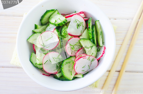 Image of fresh salad with cucumber and radish