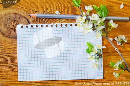 Image of flowers on wooden background