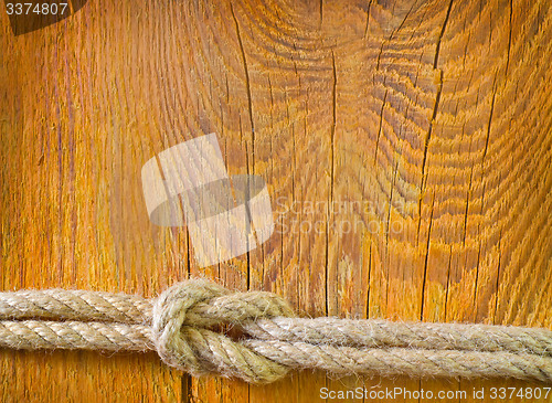 Image of rope on wooden background