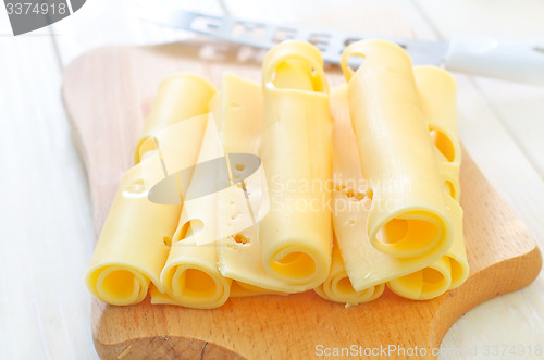 Image of cheese on wooden board